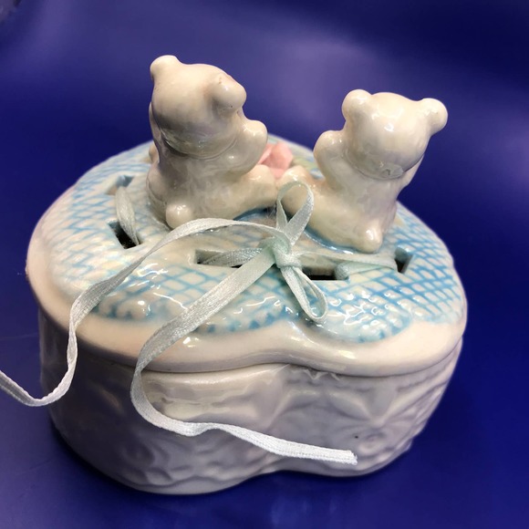 Porcelain Heart Trinket Box  2 Bears + Rose atop a blue quilt with ribbon trim. - Picture 6 of 13